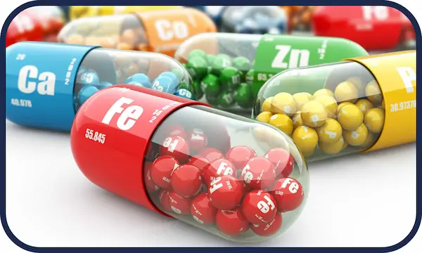 Various dietary supplements bottles and capsules